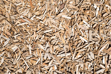 wood scraps as a safe floor in a kids playground, background