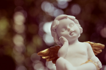 Cute angelic cupid statue, valentine day or wedding, marry concept