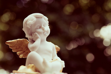 Cute angelic cupid statue, valentine day or wedding, marry concept