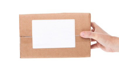 hand holding cardboard mail box isolated on a White background