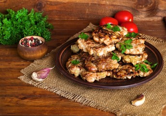 Juicy delicious meat cutlets on a wooden table in a rustic style.Selective focus