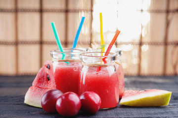Watermelon smoothie and plums