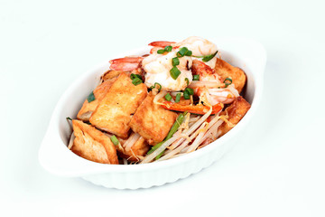 Fried shrimp with deep fried tofu on white background.