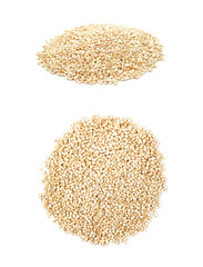 Pile of grain quinoa seeds isolated