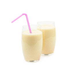 Two glasses of milkshake isolated