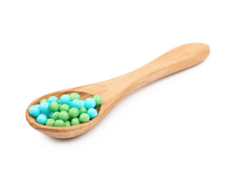 Spoon full of sprinkles isolated