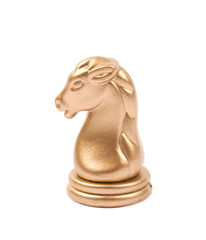 Golden knight chess figure isolated
