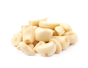 Pile of peeled garlic isolated
