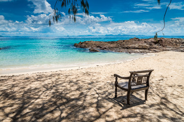 Chair on beautiful tropical island white sand beach summer holiday - Travel summer vacation concept.	