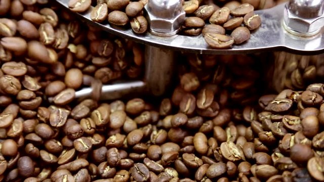 Roasting coffee beans.