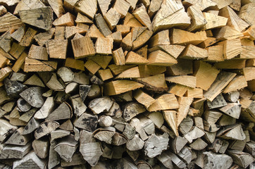 wooden logs stacked on one another
