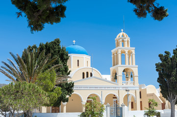 Fototapeta na wymiar View of an orthodox church in Oia - Santorini