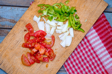 Fresh cutting vegetables on the wooden kitchen desk