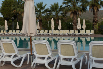 Swimming pool in a hotel under blue sky