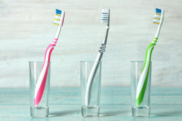 Toothbrushes for the whole family in cups