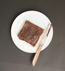 Chocolate  crunchy cream spread over bread