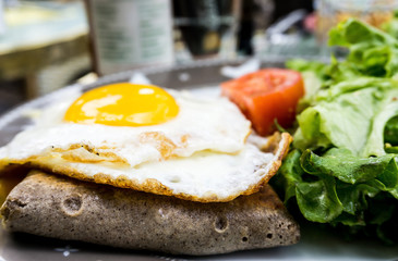 Homemade french buckwheat galette with egg