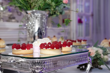Dessert table for a wedding party. Delicious sweet buffet with c