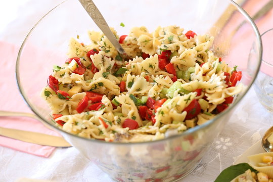 pasta salad with chopped pepperes and herbs