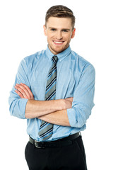 Smiling handsome man with crossed arms.