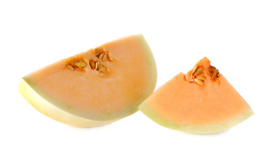 Cantaloupe melon slices on white background
