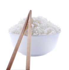 Rice in a bowl with chopsticks  on a white background