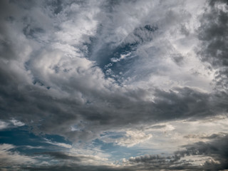 Dramatic sunset sky with clouds.