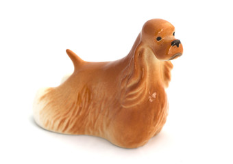 Dog figurines on white background