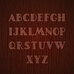 Hand drawn striped font. Capital A-Z letters. Decorative vector alphabet on wood texture