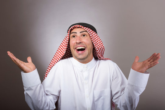 Studio portrait of a happy arabian man