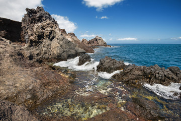 Fototapeta na wymiar Volcanic coastline landscape. South Tenerife coastline, Canary island, Spain.