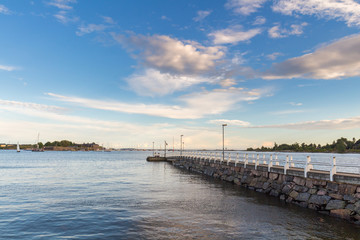 Sea pier landscape, old wooden pier and blue sky
