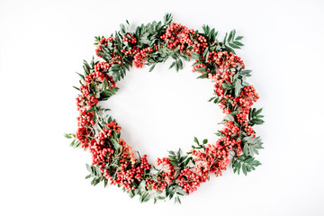 red rowan wreath frame on white background. flat lay, frame wreath, autumn wallpaper