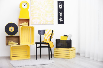 Stylish room interior with yellow furniture