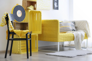 Fototapeta premium Stylish room interior with yellow couch