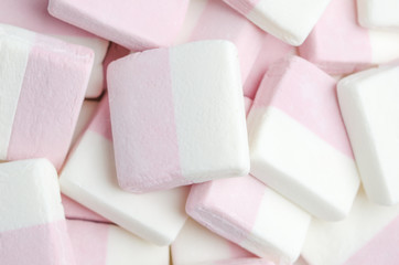 Close up of pink and white marshmallows