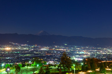 Nightscape of Kofu city, view from Fuefukigawa Fruits Park in Yamanashi, Japan