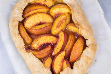 Baked homemade spiced peach galette.