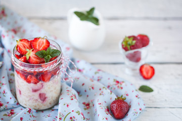 Healthy breakfast: overnight oats with fresh strawberries