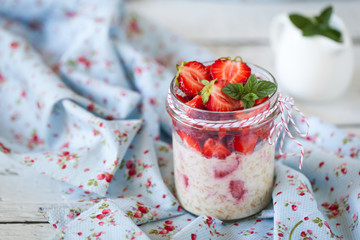 Healthy breakfast: overnight oats with fresh strawberries