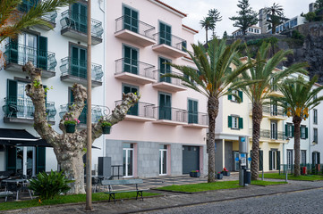 Fototapeta na wymiar Ponta do Sol embankment houses and palms.