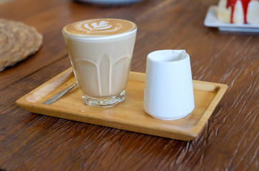 Hot Piccolo latte coffee serve with syrup in coffee shop