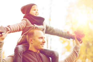 happy family having fun in autumn park