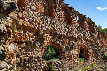The remains of a stone wall of an old house