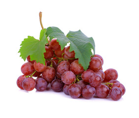 Ripe red grape with leaves isolated on white