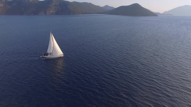 Boat sailing in Mediterranean Sea aerial footage