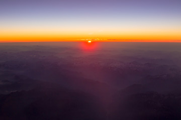 Beautiful Sunset Sunrise Over Mountains From Height Of Airplane,