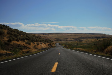 Fototapeta na wymiar Desert highway,heading west