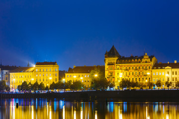 Fototapeta premium Night View Of Prague Embankment, Czech Republic. Reflection In Vltava River