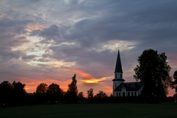 Mo kirke, Church of Nord Odal, Norway, at sunset